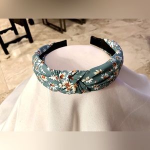New! Teal Daisy Floral Fabric Twist Knot Holiday Headband. 
Very pretty and fun.